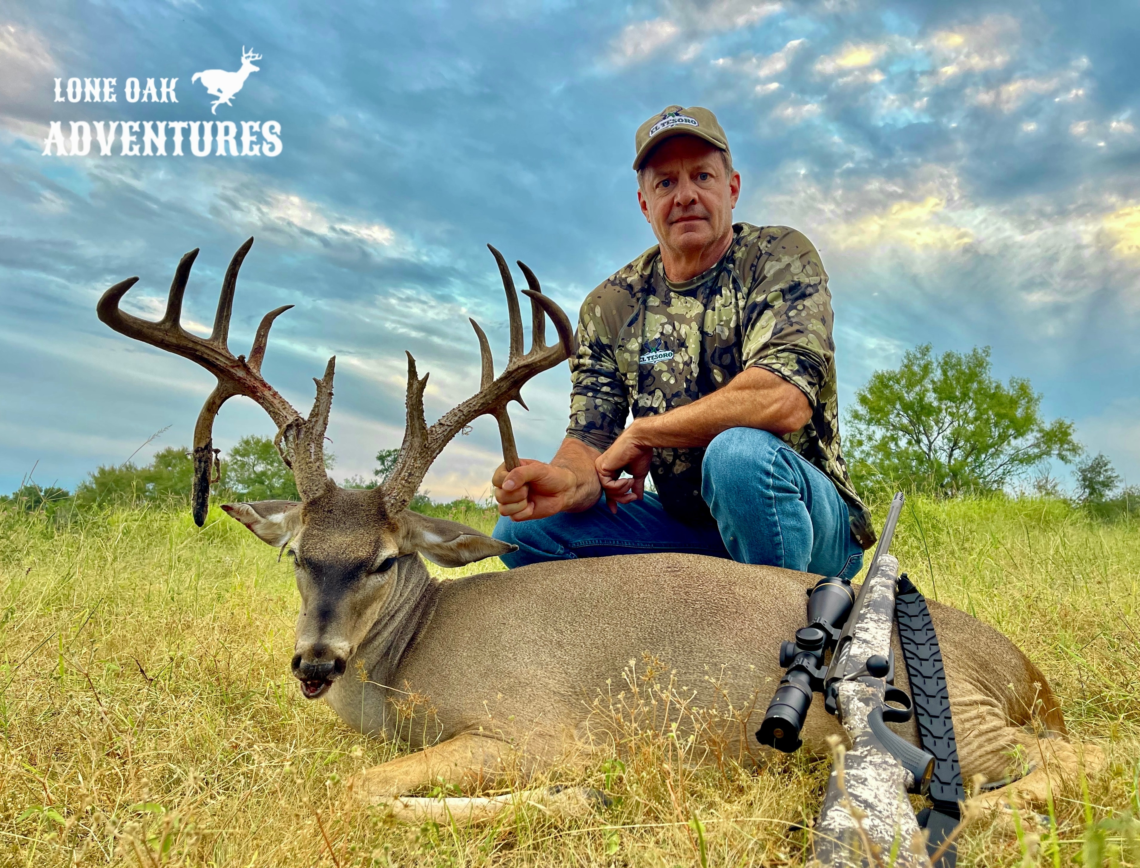 White tail deer buck standing in field